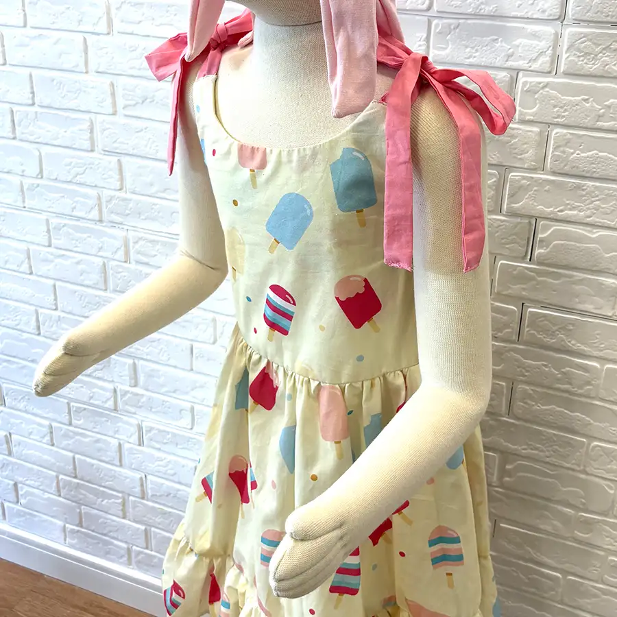 Vestido Picolés Amarelo com Laço Rosa Chiclete